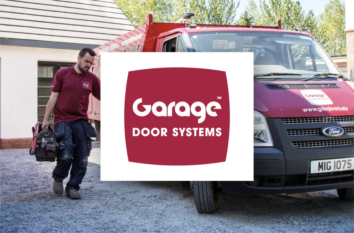 Garage Door Systems team member and a van with logo overlaid