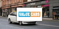 Value Cabs logo with image of a taxi in the background